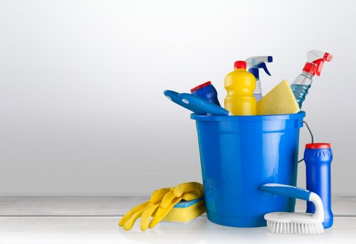 Team member applying health and safety procedures during cleaning