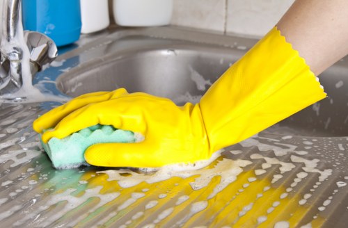 Cleaner reviewing safety precautions before using cleaning products
